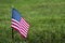 Small American flag on the grass