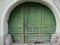 Small arch green doors