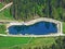 A small artificial lake on the Ijentaler Bach stream in the Obertoggenburg region, Nesslau - Canton of St. Gallen, Switzerland