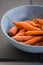 Small baby carrots in soup plates