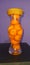 Small baby orange preserve in glass bottle