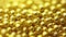 Small balls of gold. Abstract background