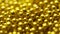 Small balls of gold. Abstract background .