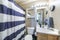 Small bathroom design with blue and white accent displays
