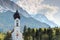 Small Bavarian church and snowy Zugspitze peak in springtime