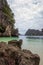 Small bay surrounded by intricate limestone,soft white sand beach and emerald color sea at Lading islandParadise island in Krabi