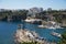 Small beach from top and panoramic shot of the rocks and buildings.