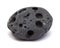 Small black volcanic pebble