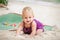 Small blonde baby girl crawling