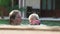 Small Blonde Child Swim with Mother