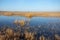Small blue lake among a dry prairie