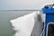 Small blue passenger taxi boat in action on the St-Lawrence river QuÃ©bec, Canada Boat at fast speed