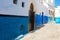 Small blue street in old Town, Medina of Rabat, Morocco. Narrow romantic street between buildings in Moroccan town