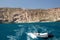 Small boat and beautiful Kalamos beach on Milos island