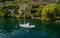 Small boat on lake from above