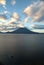 Small Boat on Lake Atitlan in front of Volcano