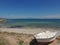 small boat moored on the beach