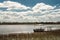 Small boat moored on Lake Mitchell on a sunny day at Southedge, Queensland, Australia