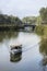 A small boat plies the canal in Palmetto Bluff, an exclusive community in South Carolina