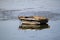 Small Boat Reflecting On The Lake