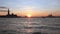 Small boat in the San Marco Basin at sunset, Venice, Italy