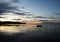 Small boat at sea at sunset near Middelfart, Denmark