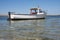 Small boat in shallow water in Brittany France