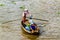 Small boat transporting people go and back to the floating market in Mekong River, Vietnam
