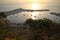 Small boats appearing with the sunrise in the morning sun in ArnavutkÃ¶y, the coastal town of Istanbul.