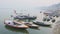 Small Boats Docked In The River Ganges Located In Varanasi, Uttar Pradesh, India. -medium