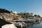 Small boats moored in Dubai Creek at Park Hyatt Golf and Yacht Club in Dubai, UAE.