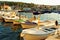 Small boats moored in the harbor of a town Postira - Croatia, island Brac