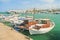 Small boats moored at port on sunny summer day