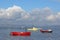 Small boats in Morecambe Bay at high tide.