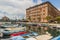 Small boats at Mrtvi canal and old buildings in Rijeka, Croat