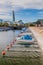 Small boats at Turbinkanalen canal in Malmo, Sweden. Turning Torso building in the backgroun