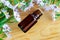 Small bottle of essential aroma oil herbal extract, tincture, infusion, top view