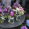 Small bouquets of lilacs, hyacinths, anemones, roses and peonies