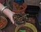 Small bowl of roasted mopane caterpillar, Gonimbrasia belina at the market in livingstone, zambia