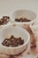 Small bowls with dried healing green tea and herbs, ritual purification and cleansing, closeup