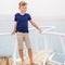 Small boy enjoying summer vacation on sea