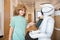 small boy interact with robot artificial intelligence, communication
