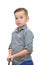 A small boy in a plaid shirt on a white isolated background stands with a MOP in his hands