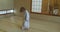 Small boy twists, twirls and dances while wearing traditional yukata