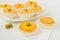 Small brazilian chicken pies are set on a white background