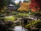 A small bridge and a pavilion contribute to the peaceful atmosphere of the Japanese garden