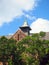 Small Bronze Clad Spire on Sandstone Block Church