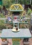 Small Buddhist Shrine with cobra snake statue