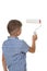 A small builder boy in blue checkered shirt, painting the wall with the paint roller, isolated on white background