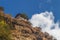 Small building on the way to Taktshang GoembaTiger`s Nest Monastery, the most famous Monastery in Bhutan, in a mountain cliff,